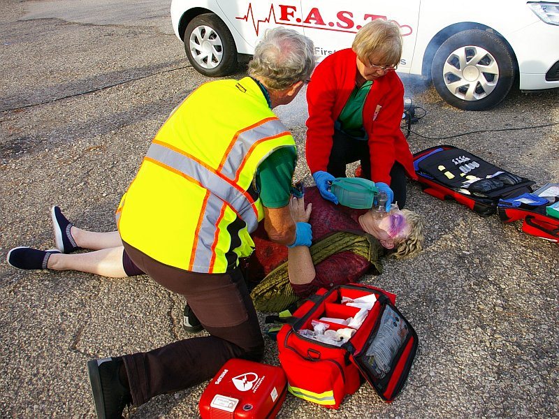 Responders Giving Aid